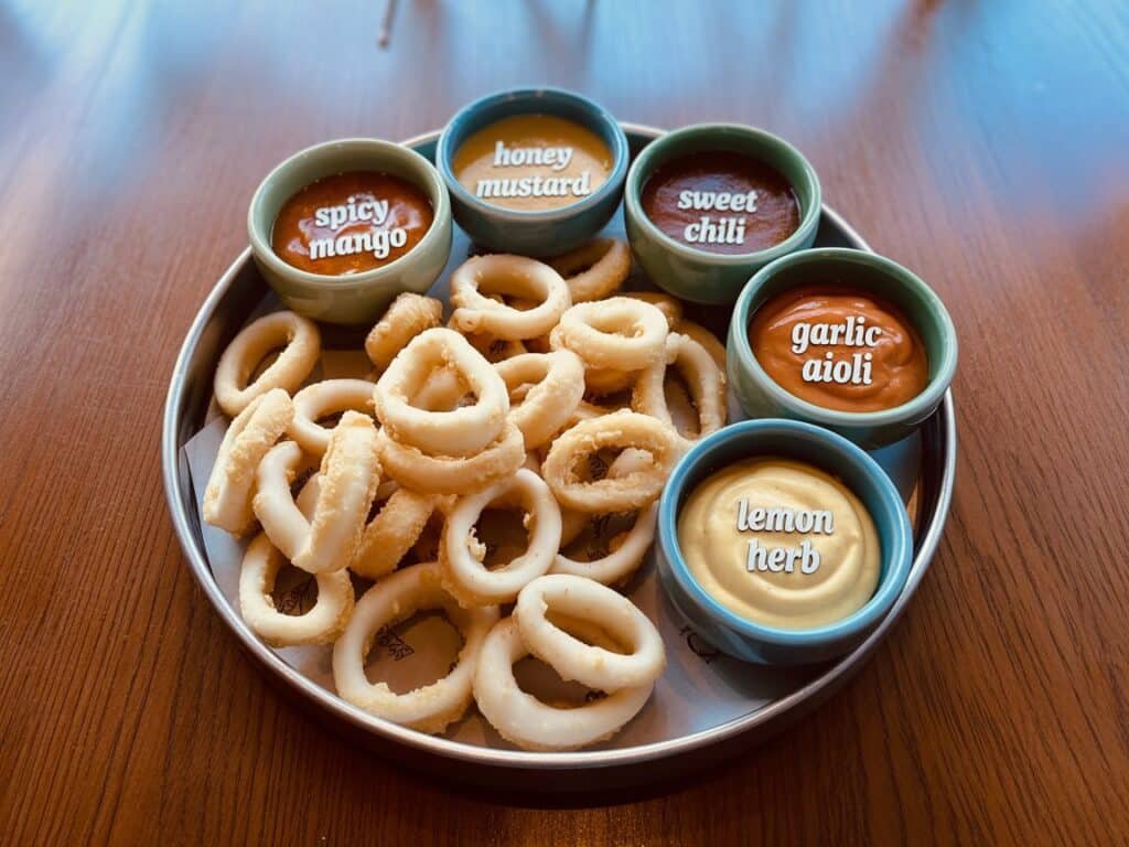 Calamari Dipping Sauce – The Best 7 Sauces You Must Try Now 8 Calamari dipping station setup with assorted sauces
